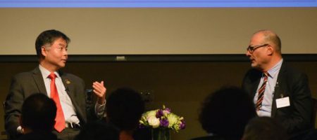 U.S. Rep. Ted Lieu speaks with UCLA professor Abel Valenzuela during an audience Q&A following the Winston C. Doby lecture.