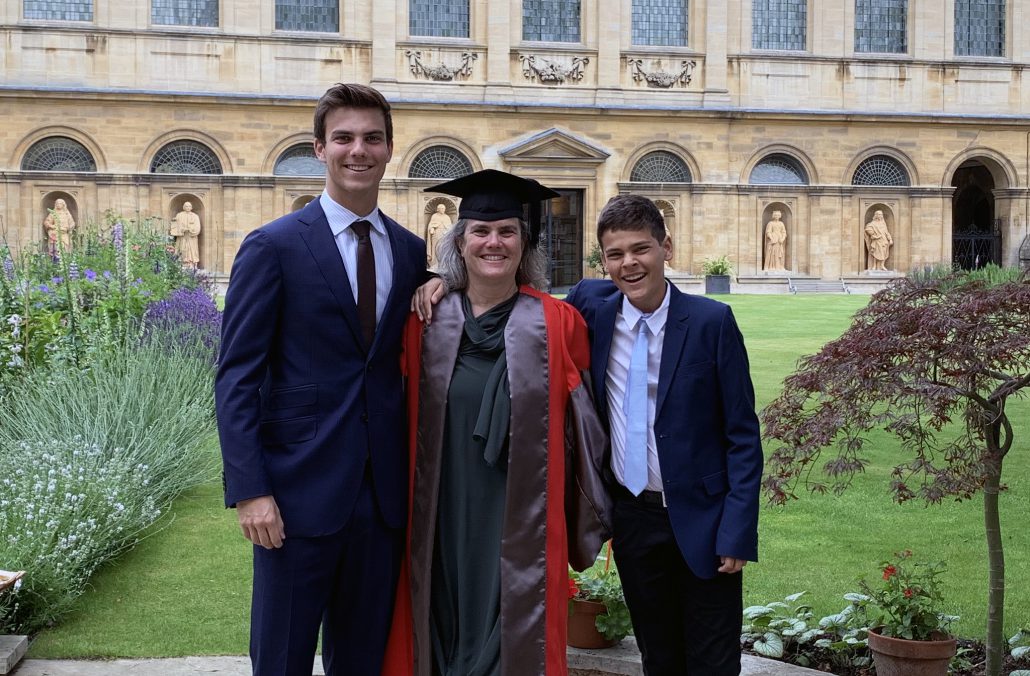 Andrea Ghez, Lauren B. Leichtman & Arthur E. Levine Chair in Astrophysics at UCLA, receiving an honorary doctorate from Oxford University on June 26, 2019. Ghez is with her sons. 