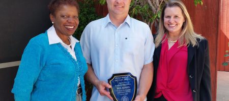 Coretta Harris, left, chair of the 2019 Gold Shield Faculty Prize Committee; Paul Barber; and Karen Sears, ecology and evolutionary biology department chair, who nominated Barber for the award.