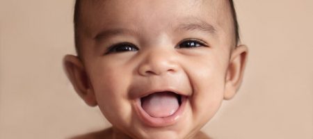 Photo of baby laughing