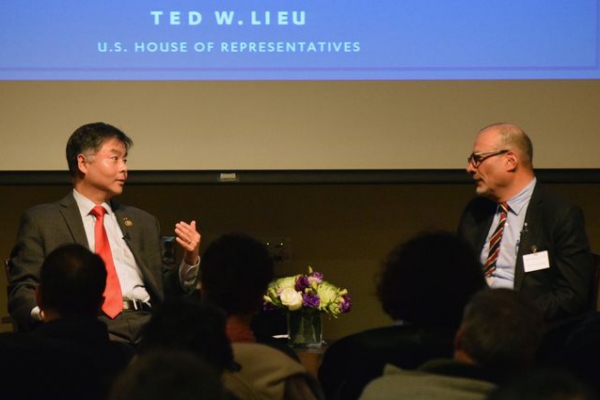 U.S. Rep. Ted Lieu speaks with UCLA professor Abel Valenzuela during an audience Q&A following the Winston C. Doby lecture.