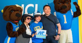 Josie and Joe Bruin welcome one of the newest Bruins.