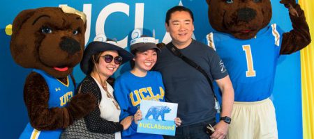 Josie and Joe Bruin welcome one of the newest Bruins.