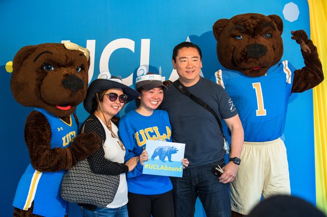 Josie and Joe Bruin welcome one of the newest Bruins.