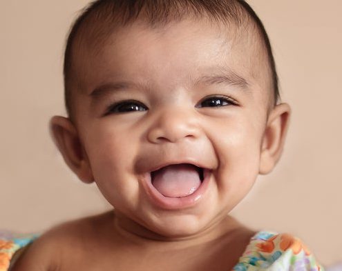 Photo of baby laughing