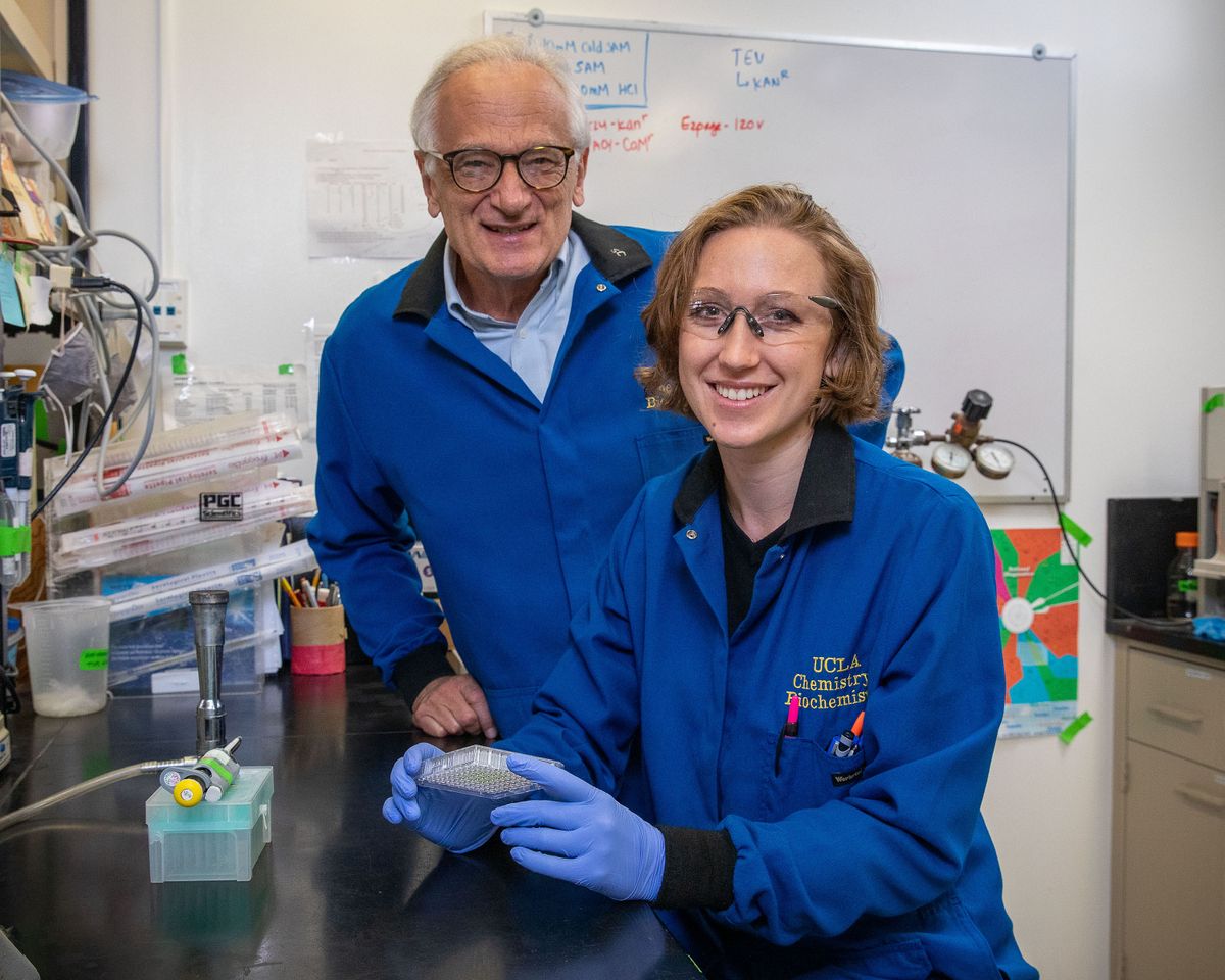 Photo of two researchers in lab.