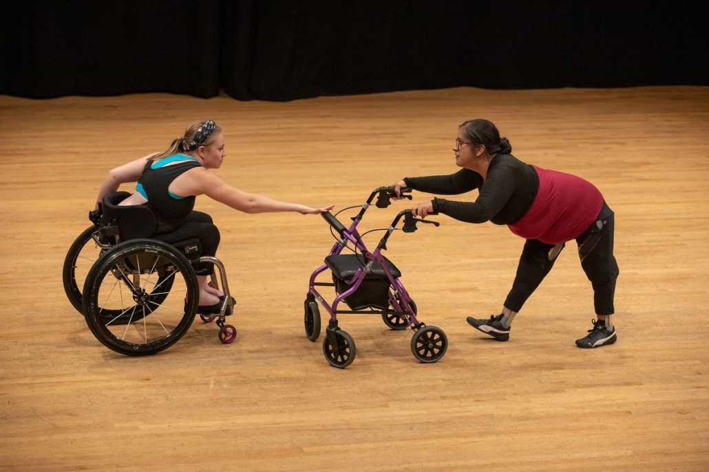 Photo of two women performing a dance duet.