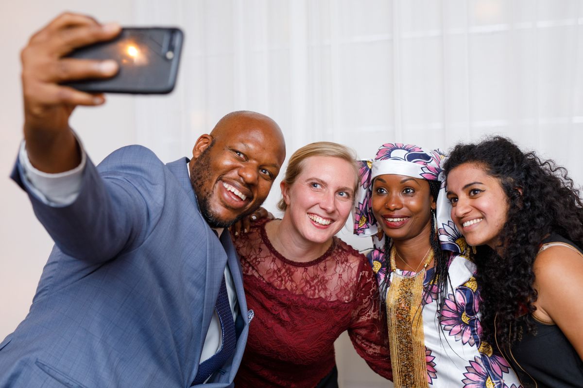 Picture of a group taking a selfie.