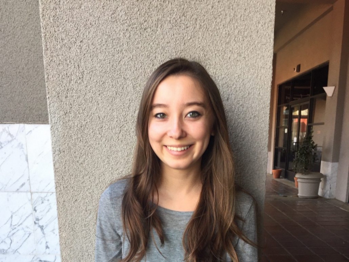 nakamura-2-e1573845769344-1030×773 Photo of student smiling.