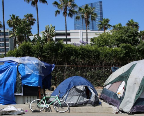 Photograph of homeless tent encampment.