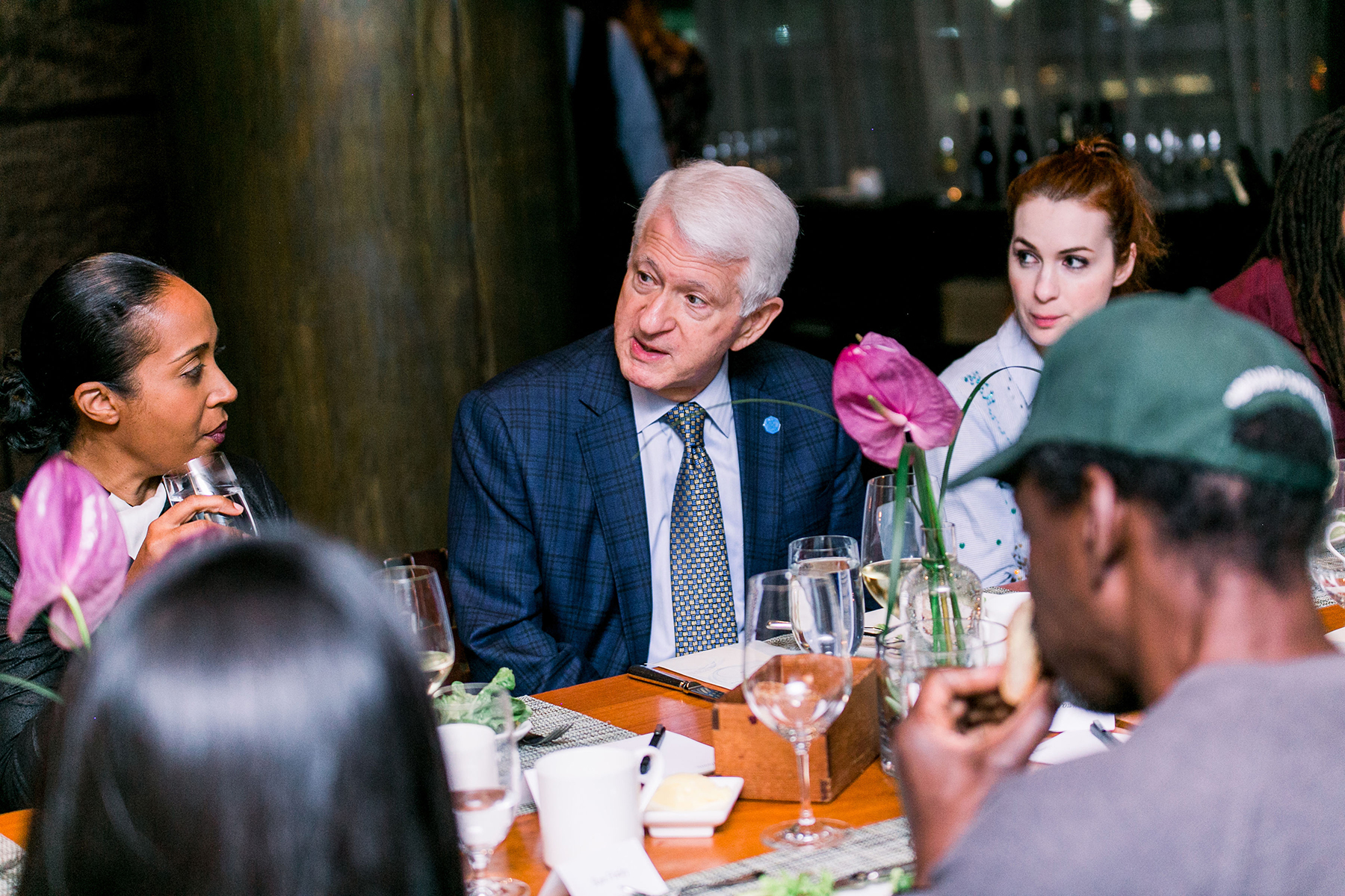 A photo of UCLA Chancellor Gene Block participating in a conversation.