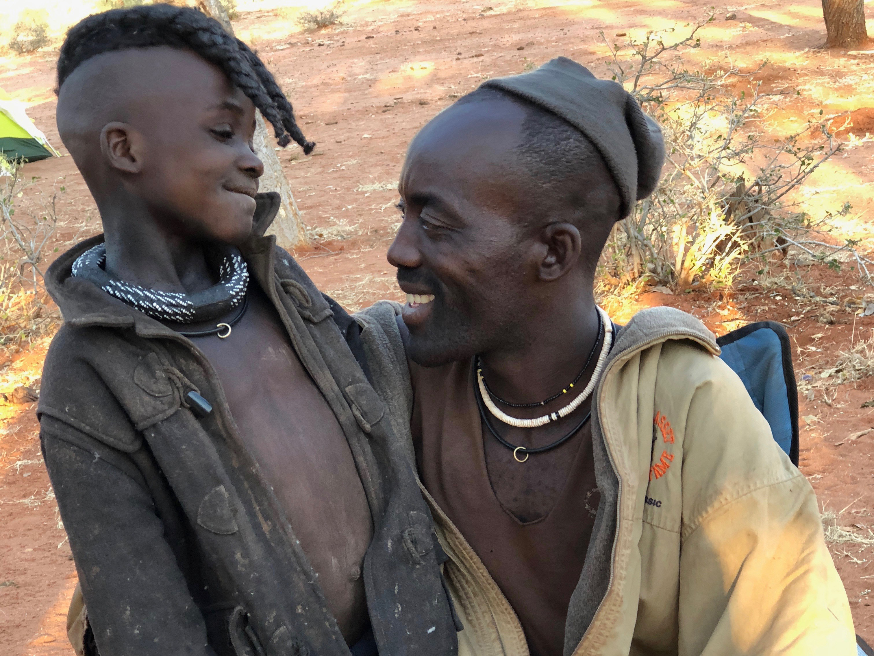 A photo of a Himba father and son.