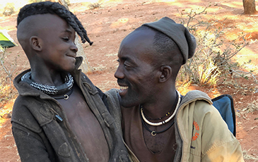 A photo of a Himba father and son.