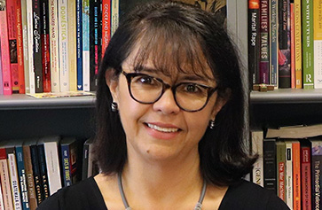 A photo of Cecilia MenjÃvar.