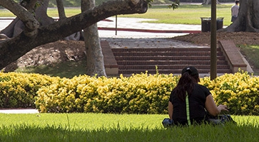 A photo of a student meditating during a break.