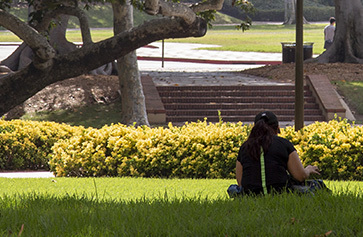 A photo of a student meditating during a break.