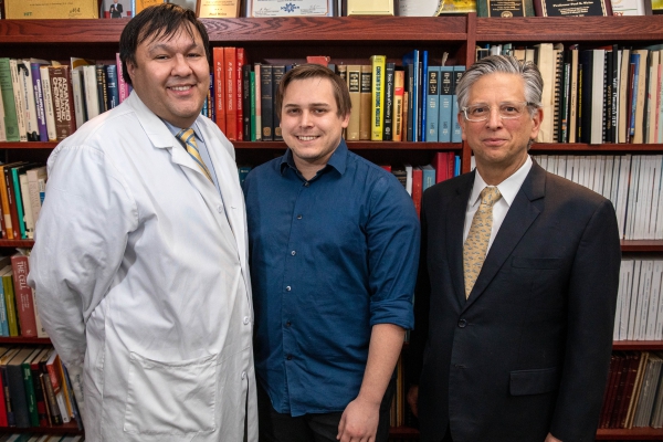 A photo of Dr. Steven Jonas, Jason Belling and Paul Weiss of UCLA .