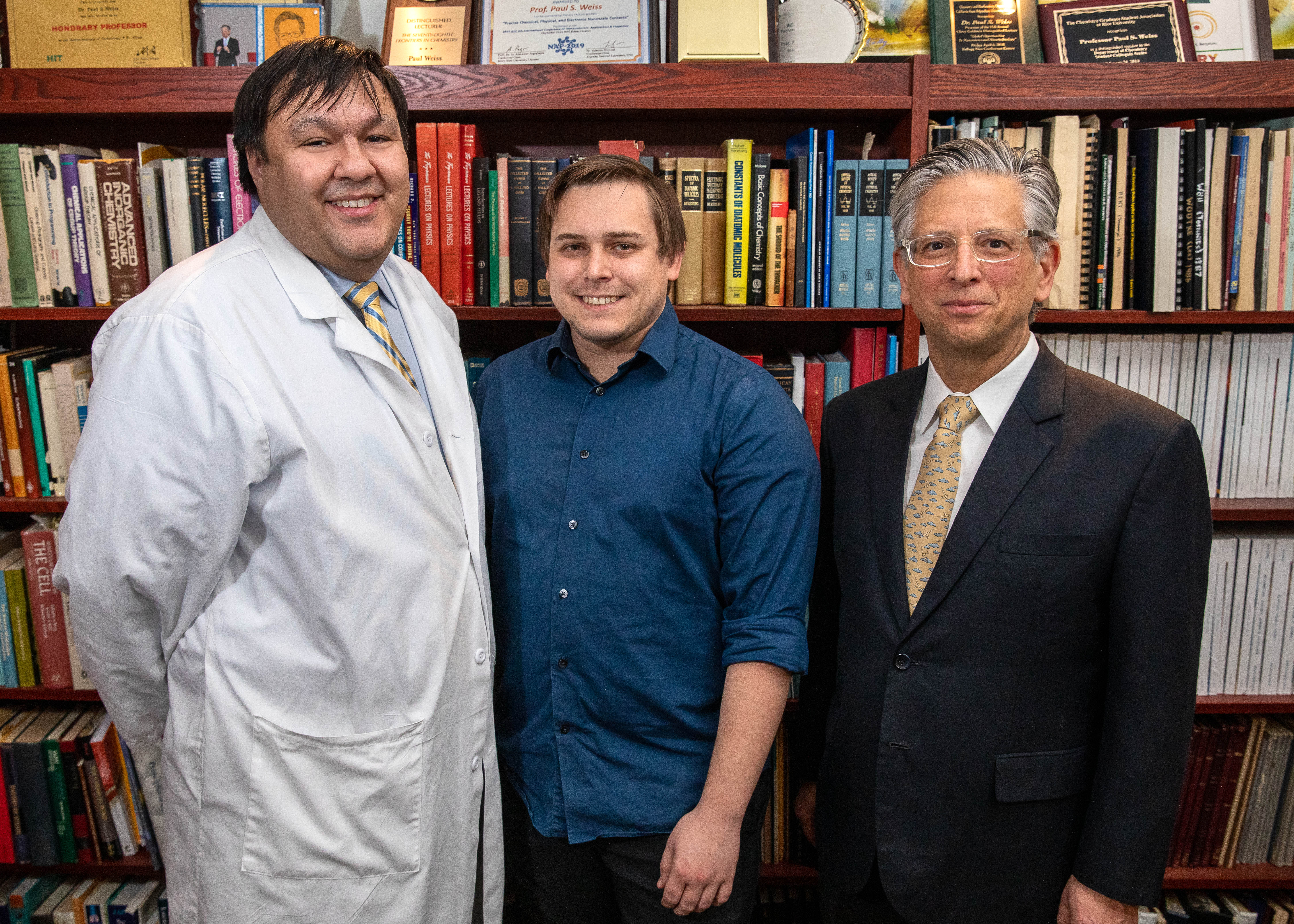 A photo of Dr. Steven Jonas, Jason Belling and Paul Weiss of UCLA .