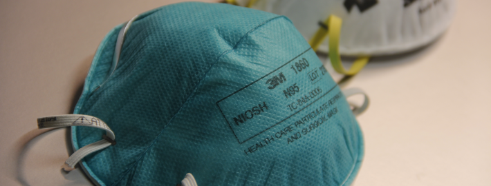 A photo of two N95 respirators.