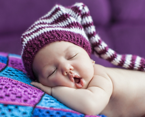 A photo of a sleeping baby.