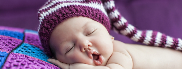 A photo of a sleeping baby.