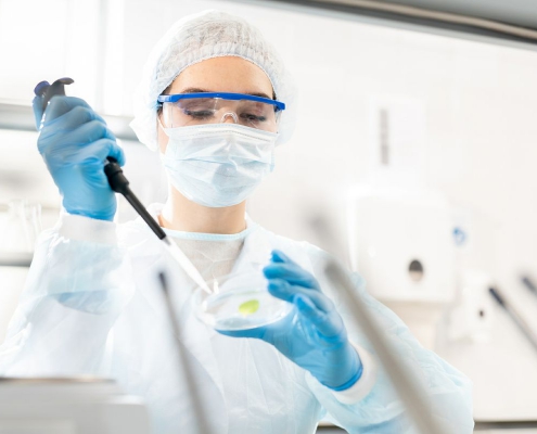 A photo of a researcher in the lab.