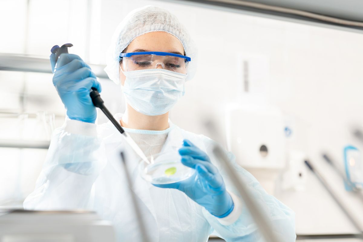 A photo of a researcher in the lab. 