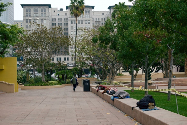 A photo of people sleeping at Pershing Square in downtown Los Angeles