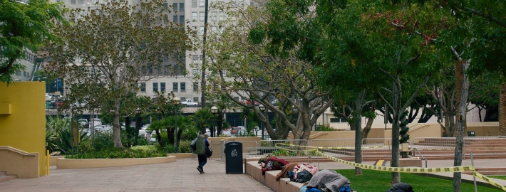 A photo of people sleeping at Pershing Square in downtown Los Angeles