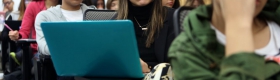 A photo of students in a lecture hall.