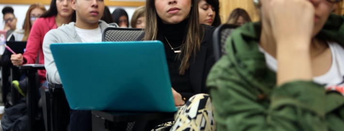 A photo of students in a lecture hall.