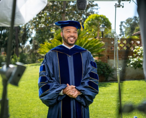 A photo of D’Artagnan Scorza filming his address to the UCLA College’s class of 2021.