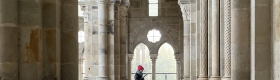 Photo of Tori Schmitt visiting Autun Cathedral in France.