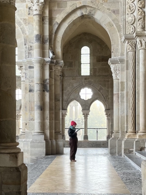 Photo of Tori Schmitt visiting Autun Cathedral in France.