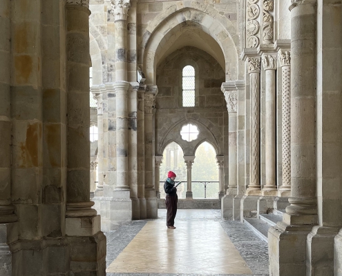 Photo of Tori Schmitt visiting Autun Cathedral in France.