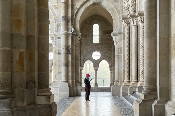 Photo of Tori Schmitt visiting Autun Cathedral in France.