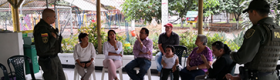 A meeting between citizens and members of the municipal police in Medellín, Colombia.