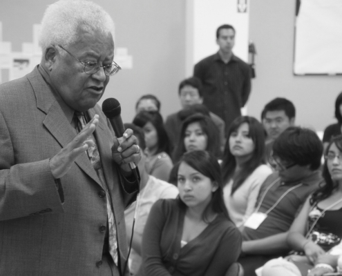 Image of Rev. James Lawson speaking to interns in the Dream Summer program, a fellowship opportunity for student immigrants and their allies.