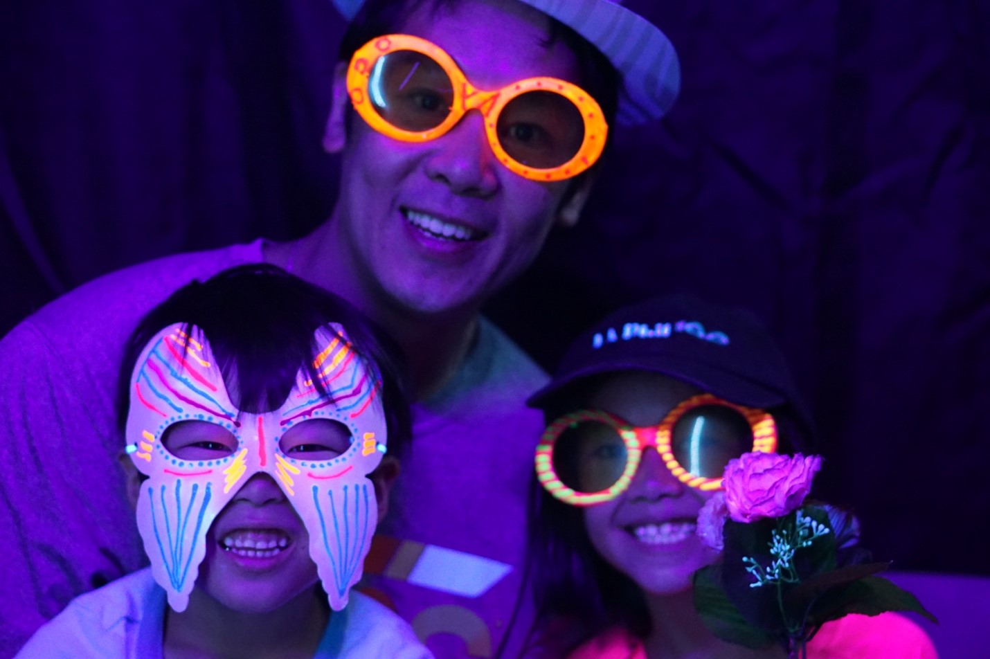 Image of a family in the Photonbooth at Exploring Your Universe