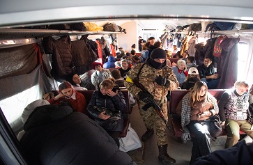 Image of people in the evacuation train at the railway station in Kyiv