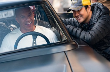 Image of actor Vin Diesel with director Justin Lin on the set of “F9: The Fast Saga.”