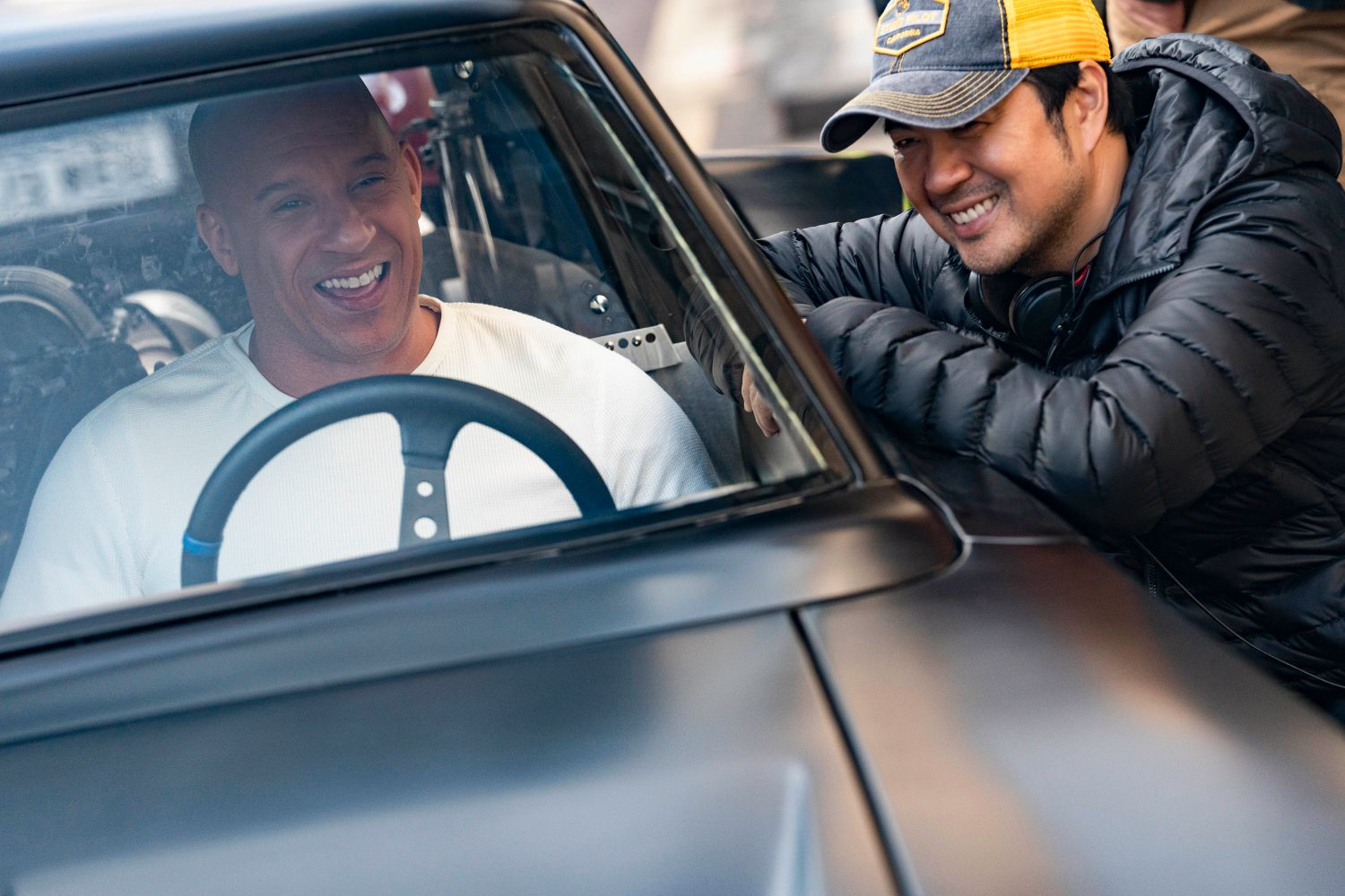 Image of actor Vin Diesel with director Justin Lin on the set of “F9: The Fast Saga.” 