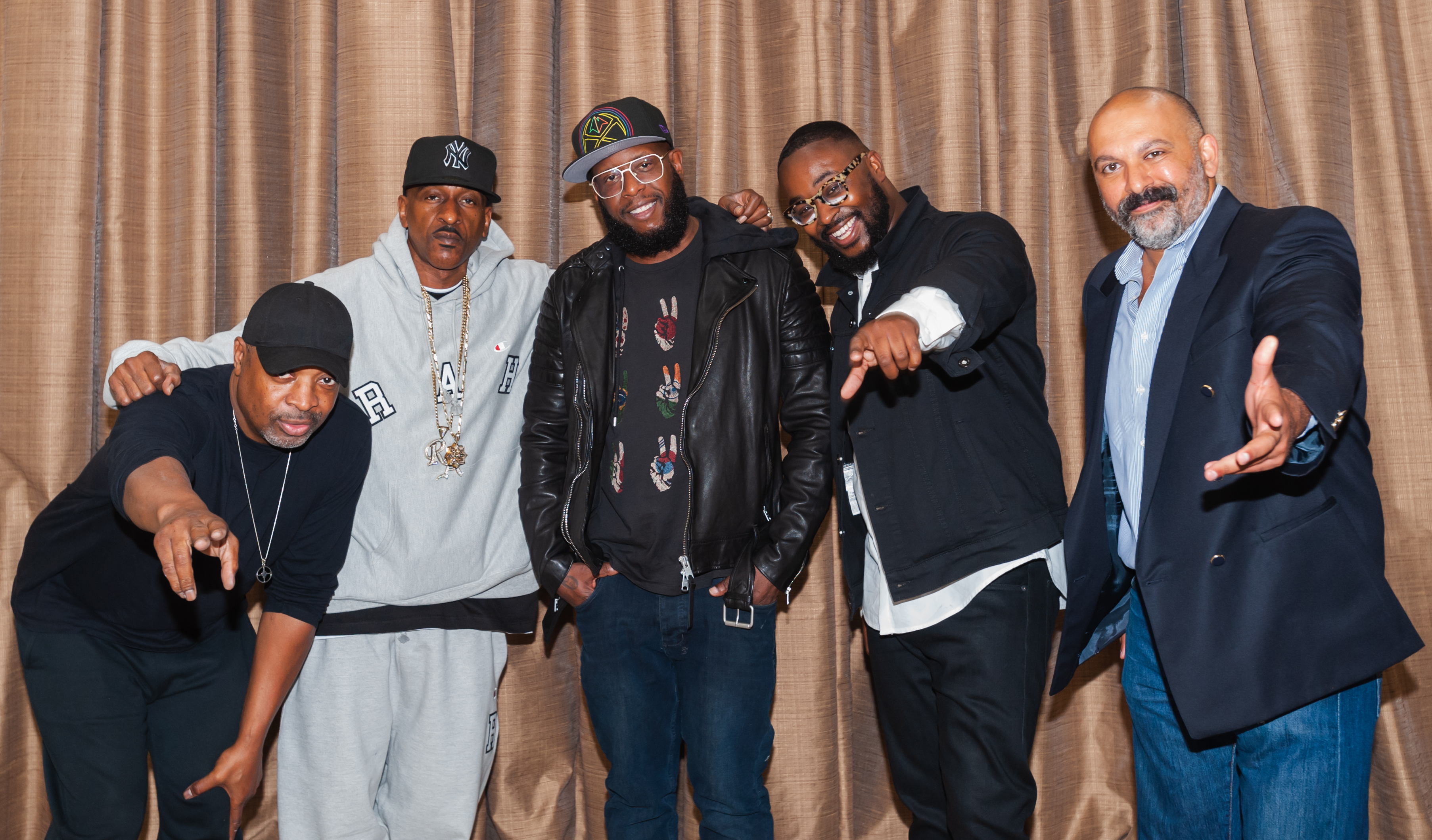 Image of Hip-hop legends Chuck D, Rakim and Talib Kweli, curator and journalist Tyree Boyd-Pates, and UCLA’s H. Samy Alim at an event at the California African American Museum co-sponsored by the Hip Hop Studies Working Group at UCLA.