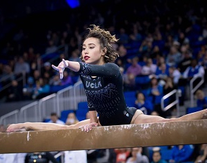 Image of Gymnast Katelyn Ohashi on the balance beam.