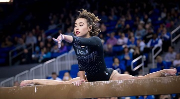 Image of Gymnast Katelyn Ohashi on the balance beam.