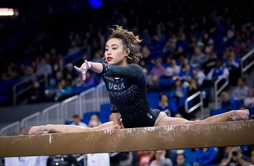 Image of Gymnast Katelyn Ohashi on the balance beam.