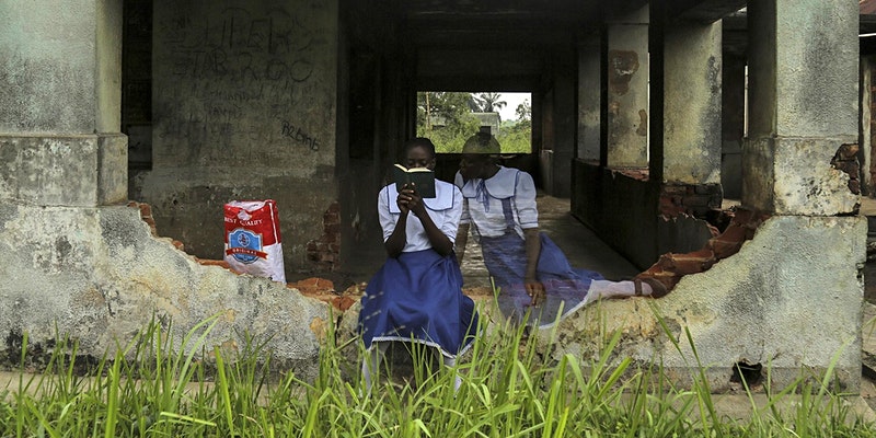 IMage: Image: Gosette Lubondo, Imaginary Trip II, 2019. © Gosette Lubondo, Courtesy Axis Gallery, NY & NJ. A woman is reading a book while an image of herself looks on. 