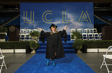 Image of Katelyn Ohashi in regalia at the UCLA College Commencement 2022