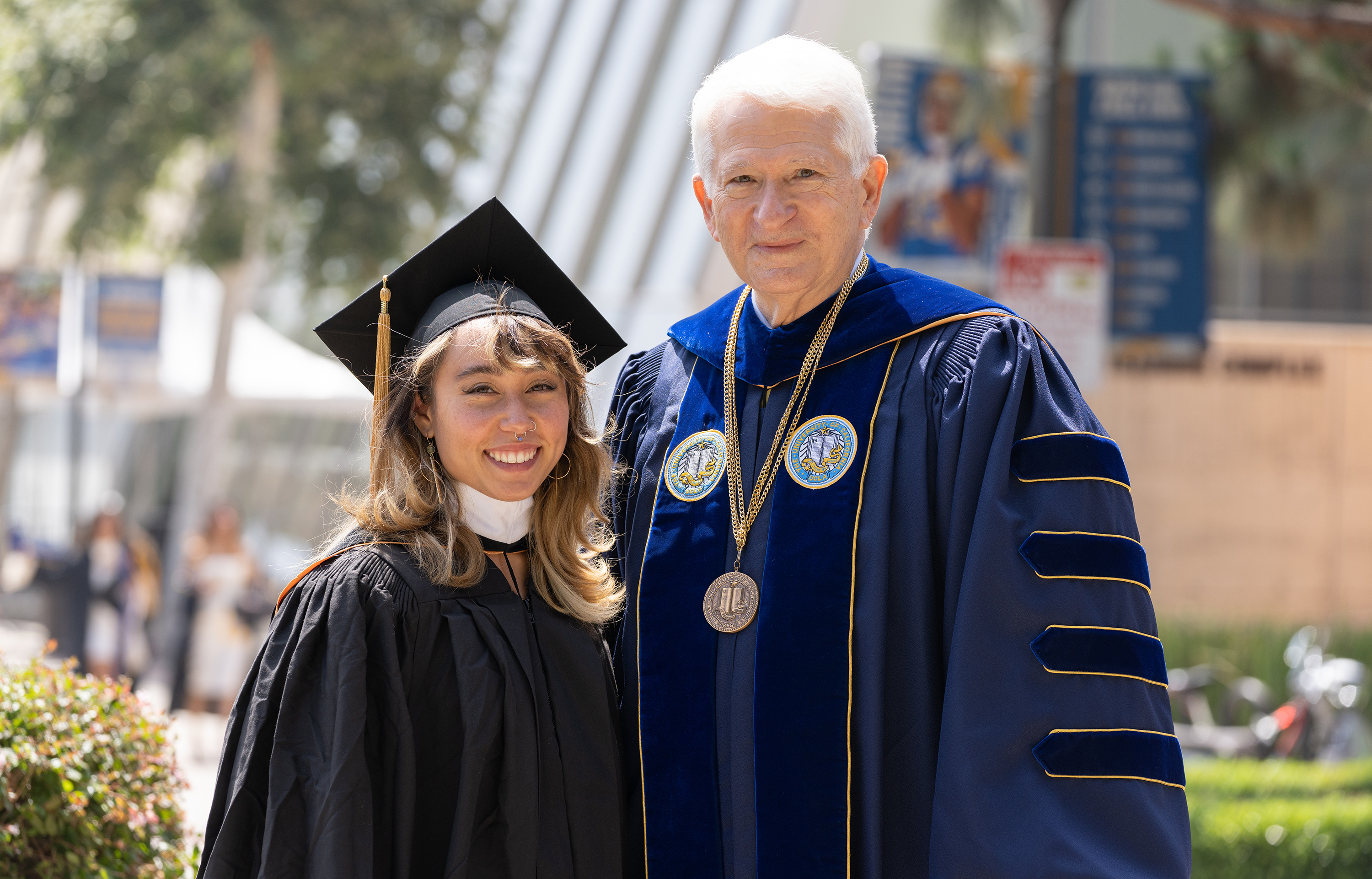 Image of Chancellor Gene Block and keynote speaker Katelyn Ohashi, alumna, gymnast and activist.