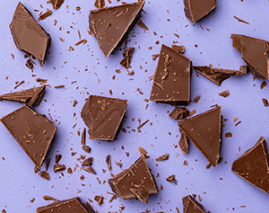 Image of chocolate on a purple background